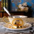 Porcelain Coffee or Tea Cup Gold Plated Legends of Egypt with Saucer and Spoon 24 Karat Gold Plated For Discount